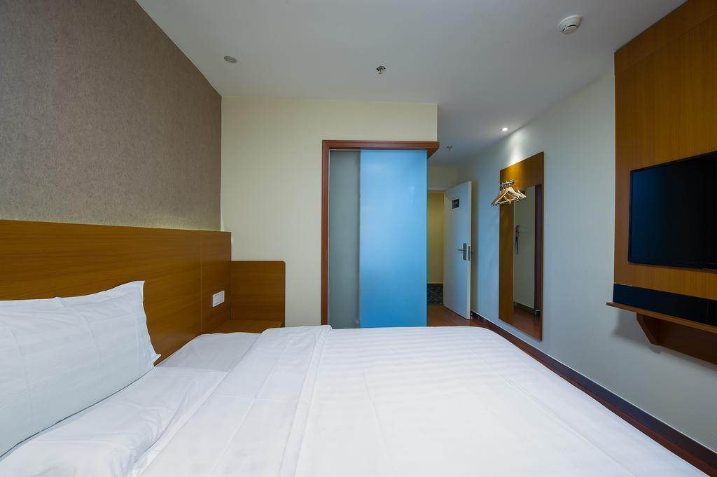 Отель 7Days Premium Guilin Seven Star International Exhibition Center Номер фото